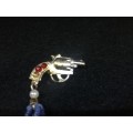 Cute revolver brooch