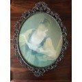 Vintage ornate metal frame with concave glass! Look!