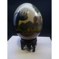 Hand painted Ostrich egg on carved wooden bottom
