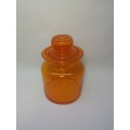 Small Bright orange glass bottle and glass lid