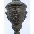 Antique style ewer with embossed Cherubs