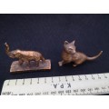 Mini bronze elephant and a cat