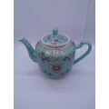 Turquoise Chinese tea pot - note chip on lid