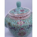 Turquoise Chinese tea pot - note chip on lid