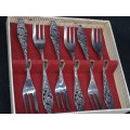 An awesome boxed set of Royal Dutch Silverworks `Elwezetta Line` cake forks