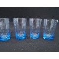 Turquoise liquor/shot glasses - one has two fleabites