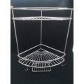 Stainless steel corner bath/shower shelf