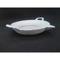 Heavy cast iron pan with spout