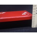 Vintage red lacquer jewelry box with dragonfly detail