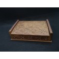 Wooden box with carved lid