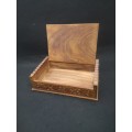 Wooden box with carved lid