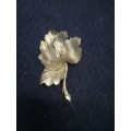 Gold color flower brooch