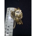 Gold color flower brooch