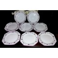 A set of art deco paragon cake plates and saucers