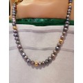 A stunning vintage pearl and gold necklace