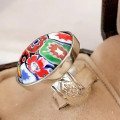 A stunning millefiore sterling silver ring
