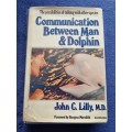 Communication Between Man and Dolphin by John C Lilly M D