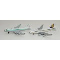 Pair of Matchbox Boeing 747 airliners: Singapore Airlines and Cathay Pacific