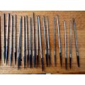 A large collection of assorted engraving tools