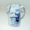 Antique Blue and White Embossed  Milk Jug with Dutch Barge and Mark