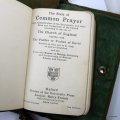 1910 COMMON PRAYER BOOK, LEATHER BOUND, IN ORIGINAL LEATHER BAG.