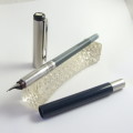 Smart blue and steel Parker Vector cartridge fill fountain pen in good and working condition.