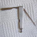 Vintage stainless steel tobacco pipe tamper tool