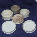 Collection of antique ceramic paste pots and lids
