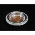 Antique silver plate and wood wine bottle coaster.