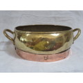 Vintage copper and brass two handled pot holder.