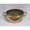 Vintage copper and brass two handled pot holder.