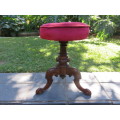 Red Victorian piano stool