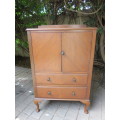 Vintage cabinet with drawers.