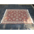 A Persian design Kelim carpet.