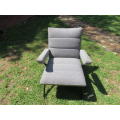 Retro upholstered steel open armchair