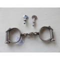 A pair of antique 1880`s Hiatt best warranted wrought handcuffs with key