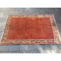 A Persian hand knotted Sarab rug.