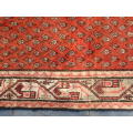 A Persian hand knotted Sarab rug.