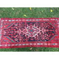 A Persian hand knotted Borjelo rug