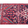 A Persian hand knotted Borjelo rug