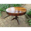 Vintage oval shaped stinkwood side table