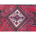 A Persian hand knotted Zanjan rug