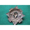 South Africa - 1899-1939 - Kimberley Regiment Voided Cap or Pouch Badge ?