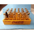 Coca Cola Vintage Miniature Crate with 24 Miniature Coke Bottles.1970-60`s  R 709.00 View scans