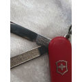 Vintage Victorinox Swiss  pocket knife with sheath - see condition piece of cover chipped off