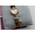 Unused Saga "Fairy Whisper" Limited edition Bracelet watch with Swarovski Crystal charms.