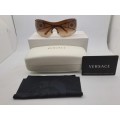 Pre-owned Versace Sunglasses still in packaging
