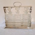 Antique Silver Plate Tantalus (3 Decanther set ) England -
