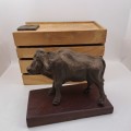 a Buffalo Figurine (Hand Made) in wooden Crate -ONE FOOT/HOOF BROKEN