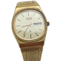 Vintage 1980`s Citizen Quartz  Mens watch 1250-212361-Y Gold tone Day/Date Watch working in case